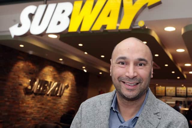 Franchisee Haj Atwal at his new Subway branch in Livingston, the brand's 5,000th in Europe. Picture: Contributed