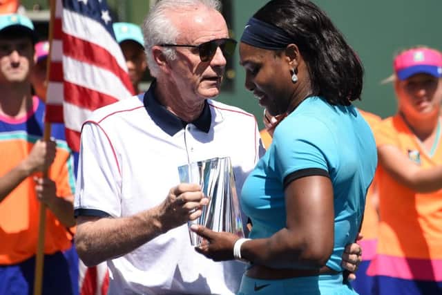 Raymond Moore, pictured with Serena Williams, has quit as Indian Wells tournament director. Picture: Robyn Beck/AFP/Getty Images