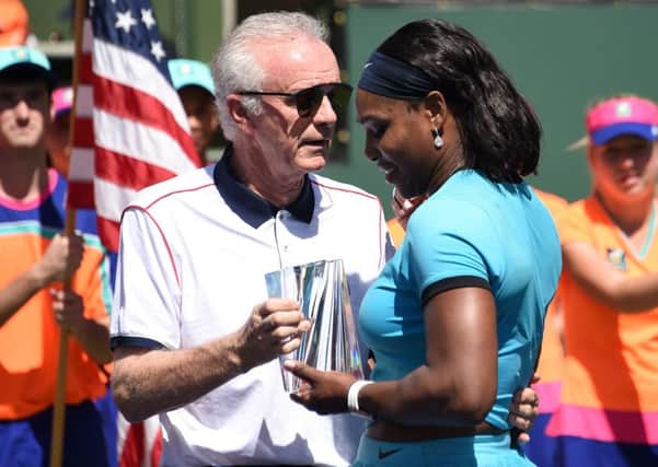 Raymond Moore, pictured with Serena Williams, has quit as Indian Wells tournament director. Picture: Robyn Beck/AFP/Getty Images