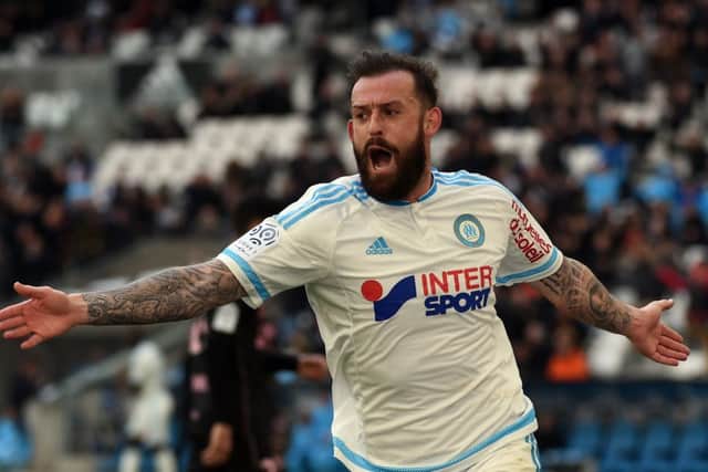 Steven Fletcher celebrates scoring for Marseille against Toulouse. Picture: Anne-Christine Poujoulat/AFP/Getty Images