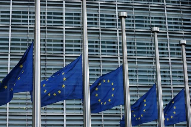 EU flags fly at half mast outside EU Commission Headquarters in Brussels. Picture: Getty Images