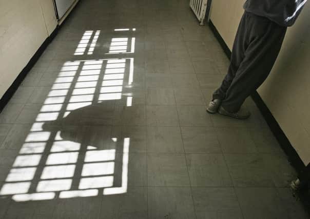 How might Automatic early release affect Scotland's justice system. (Photo by Peter Macdiarmid/Getty Images)