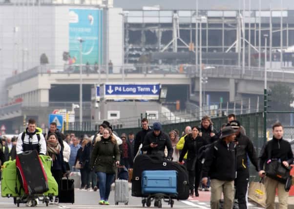 Passengers are evacuated from Zaventem Bruxelles International Airport after the terrorist attack. Picture: Getty