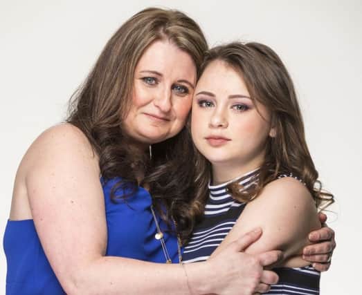 Diane and Morgan Steele. Morgan is 14 and she currently has thyroid cancer.   Picture: Andy Barr. Hair and make-up by Taylor Ferguson