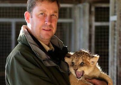 Gary Gilmour, Blair Drummond Safari Park manager, with a tiger cub