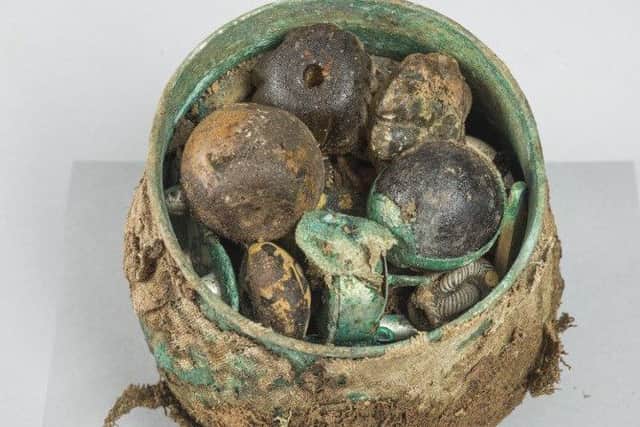 More than ten centuries after being buried in a field in Galloway, the pot of Viking treasure has been viewed for the first time.
 
Picture: Contributed