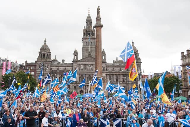 Independence campaigners gathered in Glasgow's George Square to mark the anniversary of the referendum. Picture: John Devlin