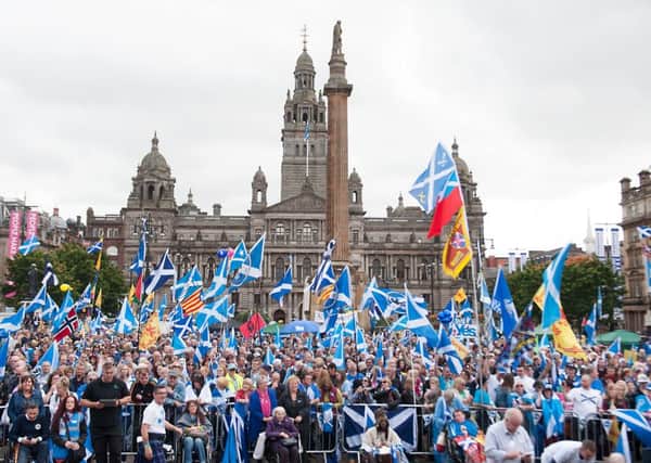 Independence campaigners gathered in Glasgow's George Square to mark the anniversary of the referendum. Picture: John Devlin