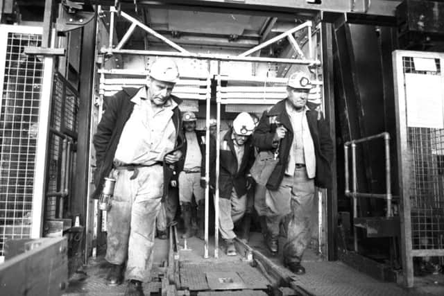 Coal miners leave the cage at the Castlebridge shaft of Longannet complex in Fife, October 1986.