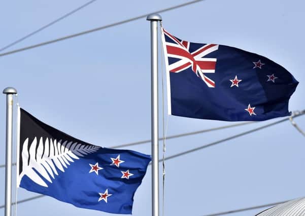 The alternative silver fern flag, left, failed to gain enough momentum to secure change. Picture: AFP/Getty Images