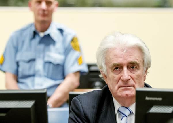 Bosnian Serb wartime leader Radovan Karadzic sits in the courtroom for the reading of his verdict in The Hague. Picture: AFP/Getty Images