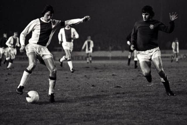 Ajax forward
Johan Cruyff, left, is shadowed by Rangers' Derek Johnstone during the 1973 Super Cup final first leg at Ibrox. Picture: SNS Group