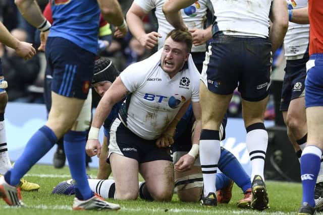 Stuart Hogg celebrates after scoring Scotland's first try against France. Picture: Ian Rutherford