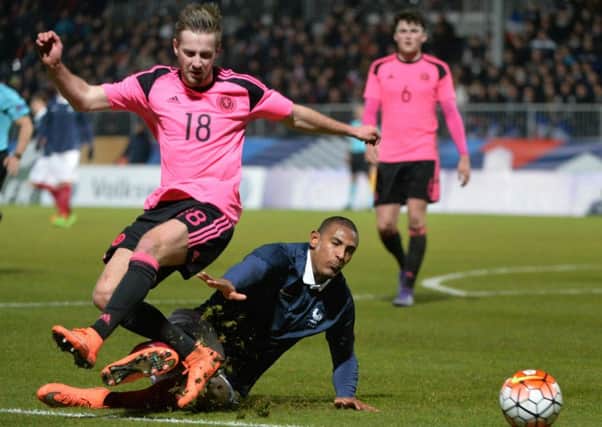 Scotland midfielder Billy King vies with France forward Sebastien Haller.  Picture: Jean-Francois Monier/AFP/Getty Images
