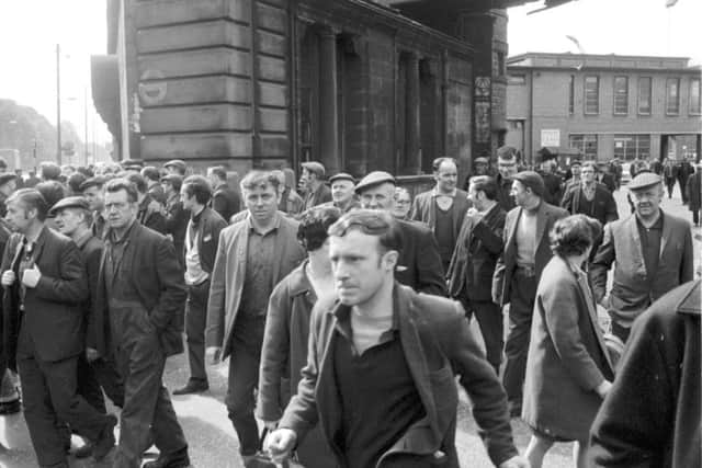 Shipyard workers leave the Govan division of the Upper Clyde Shipbuilders in June 1971.