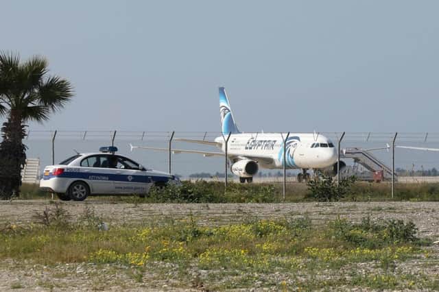 The hijacked EgyptAir plane sits on the tarmac at Larnaca Airport. Picture: AFP