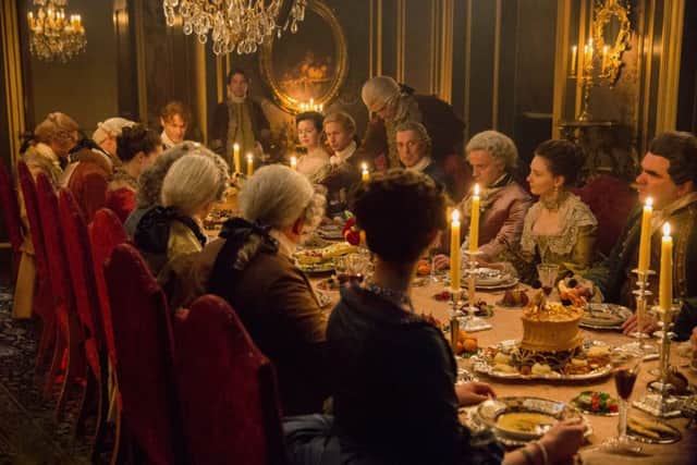A banquet scene in Outlander's second season