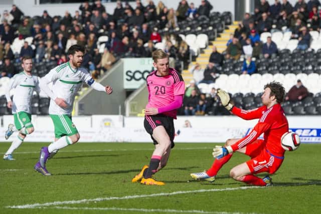 liver McBurnie scores the equaliser for Scotland Under 21s. Picture: SNS