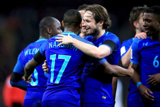 Luciano Narsingh celebrates scoring the Netherlands' second goal at Wembley with team-mate Daley Blind. Picture: Mike Egerton/PA Wire