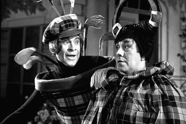 Performing in Panto in Cinderella at the King's Theatre, Edinburgh.

Ronnie Corbett and Stanley Baxter as the Ugly Sisters.