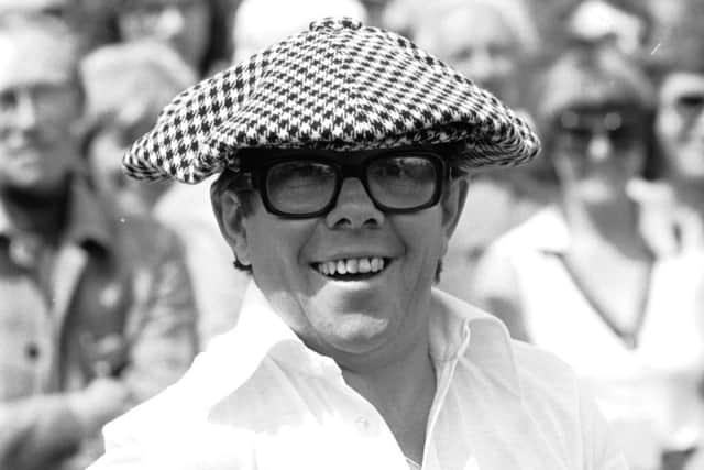 Ronnie Corbett in an outsize bunnet during the Jimmy Tarbuck Pro-Am golf tournament at Dalmahoy, July 1977.