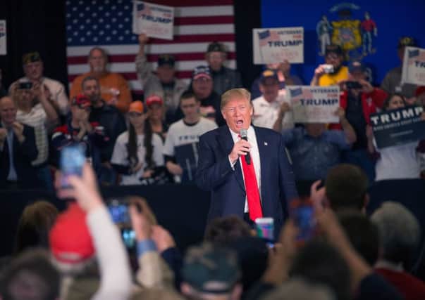 Republican candidate Donald Trump speaks to guests during a campaign rally in Appleton, Wisconsin. Picture: Getty