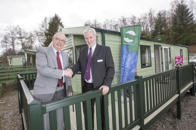 Argyll Holiday Homes hands over home to Charity Children in Poverty.