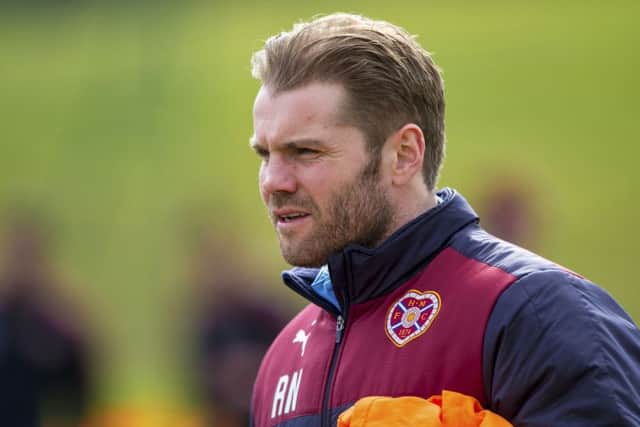 Hearts head coach Robbie Neilson is confident his side can cause a Celtic Park upset. Picture: SNS