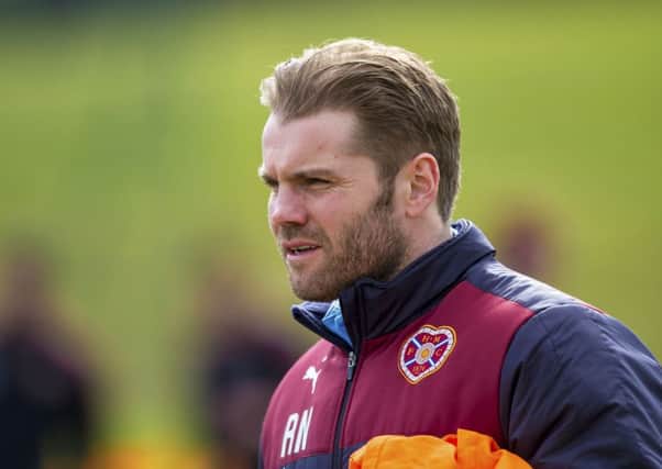 Hearts head coach Robbie Neilson is confident his side can cause a Celtic Park upset. Picture: SNS