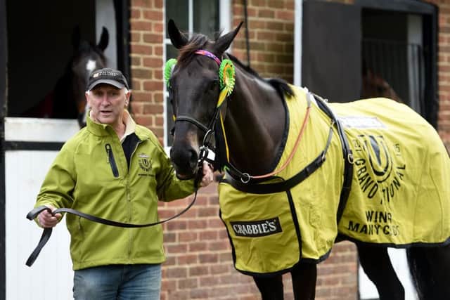Trainer Oliver Sherwood with his double Grand National hopeful Many Clouds. Picture: PA