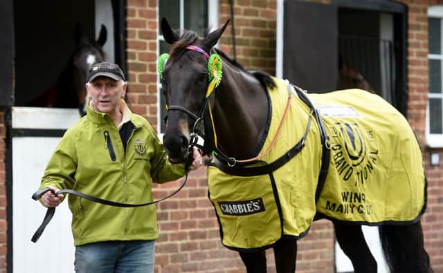 Trainer Oliver Sherwood with his double Grand National hopeful Many Clouds. Picture: PA