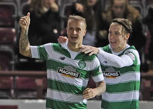 Leigh Griffiths celebrates after opening the scoring in Celtic's October League Cup win over Hearts. Picture: Neil Hanna