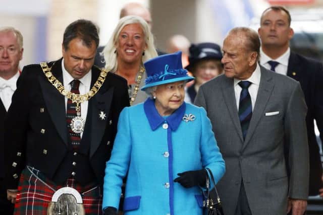 Queen Elizabeth II and the Duke of Edinburgh, who this morning were reported, falsely, to be campaigning to keep Britain in the EU. Picture: PA