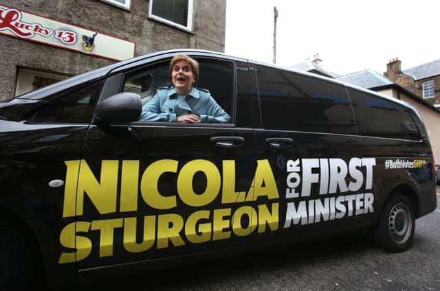 The SNPs Nicola Sturgeon takes to the road. Picture: PA