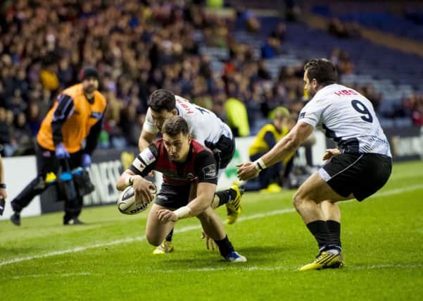 Damien Hoyland scores his second try as Edinburgh overcome a spirited Zebre side last night. Picture: SNS