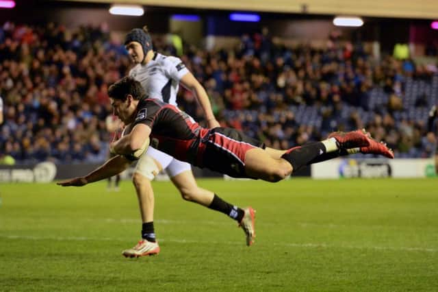 Edinburgh's Sam Hidalgo-Clyne scores the third try for his side. Picture: SNS