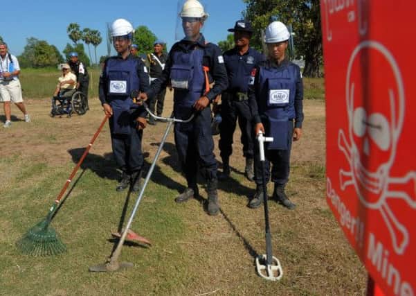 The men work as landmine clearers in Afghanistan. Picture: Picture: AFP/Getty Images