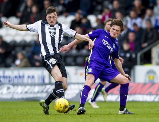 Calum Gallagher and Hibernian's Liam Henderson. Picture: SNS Group