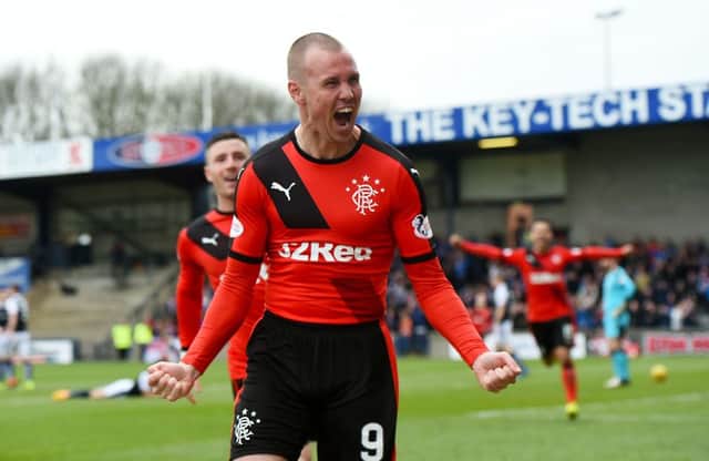 Rangers' Kenny Miller celebrates as he puts his side back in front. Picture: SNS Group