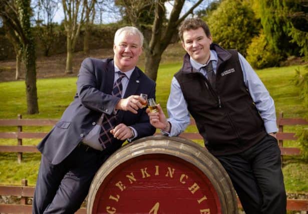 Glenkinchie Distillery manager, Ramsay Borthwick,and Derek Robertson, CEO of Keep Scotland Beautiful, raise a dram asthey toast Diageos success in environmental excellence