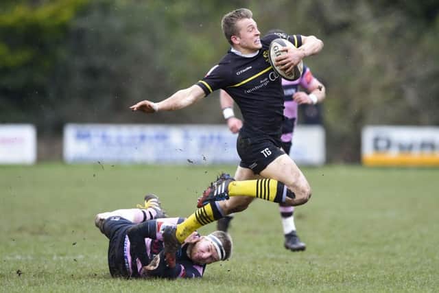 Ayrs David Armstrong brings down Melrose stand-off Tom Galbraith during Saturdays semi-final. Picture: SNS