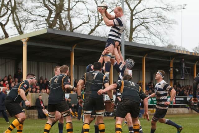 Jason Hill leaps high for Heriots at a line-out during Saturdays dramatic Premiership play-off which Heriots won with the last kick of the match. Picture: Toby Williams