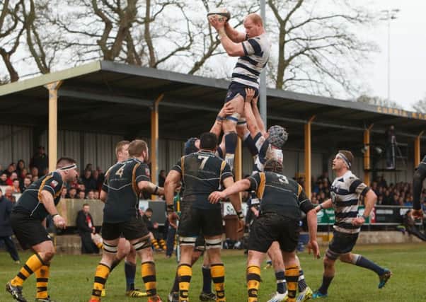 Jason Hill leaps high for Heriots at a line-out during Saturdays dramatic Premiership play-off which Heriots won with the last kick of the match. Picture: Toby Williams