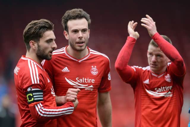 Aberdeen's Greame Shinnie and Ash Taylor at full-time. Picture: SNS
