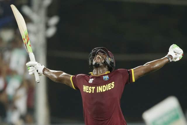 West Indies Carlos Brathwaite celebrates after his fourth successive six secured victory in Kolkata. Picture: AP