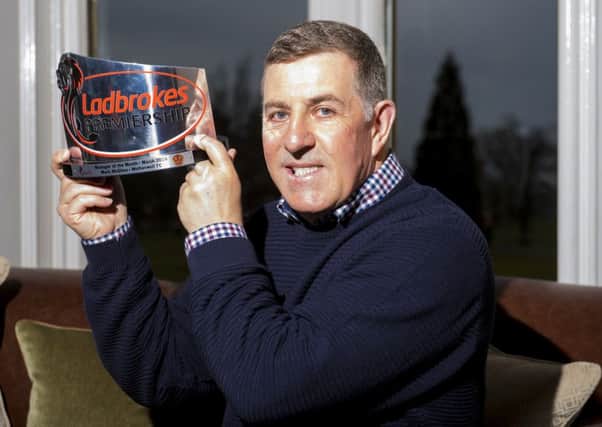 Motherwell manager Mark McGhee receives the Ladbrokes Premiership Manager of the Month Award for March. Picture: SNS