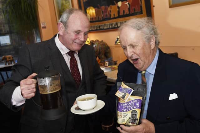 Ralph Lutton (MD of Brodies) and Alexander McCall Smith in The Elephant House to mark the launch of Scotland Street Coffee. Pic Greg Macvean.