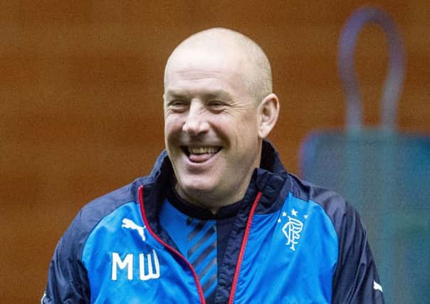 Rangers manager Mark Warburton enjoys a lighter moment in training at Murray Park yesterday. Picture: SNS