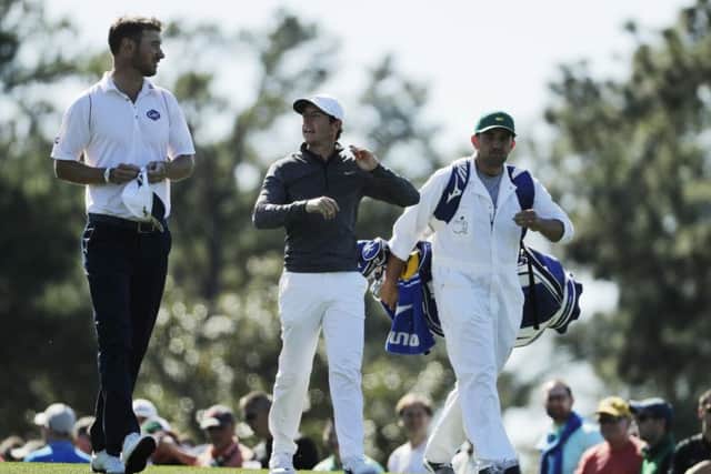 Rory McIlroy made a hole-in-one at the 16th in a practice round with Chris Wood. Picture: AP
