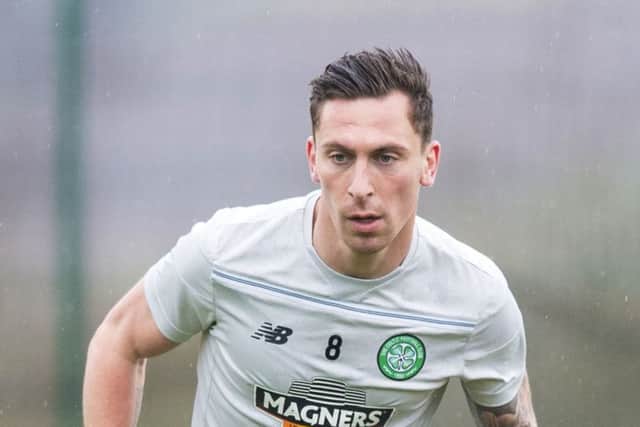 Brown put in a two-footed challenge on Hearts' striker Juanma. Picture: SNS